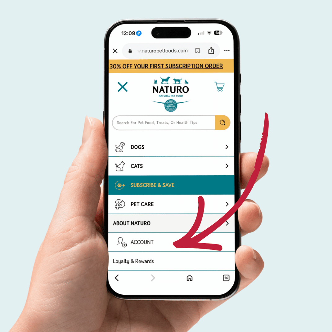 Hand holding a smartphone displaying the Naturo Pet Foods app on a light blue background