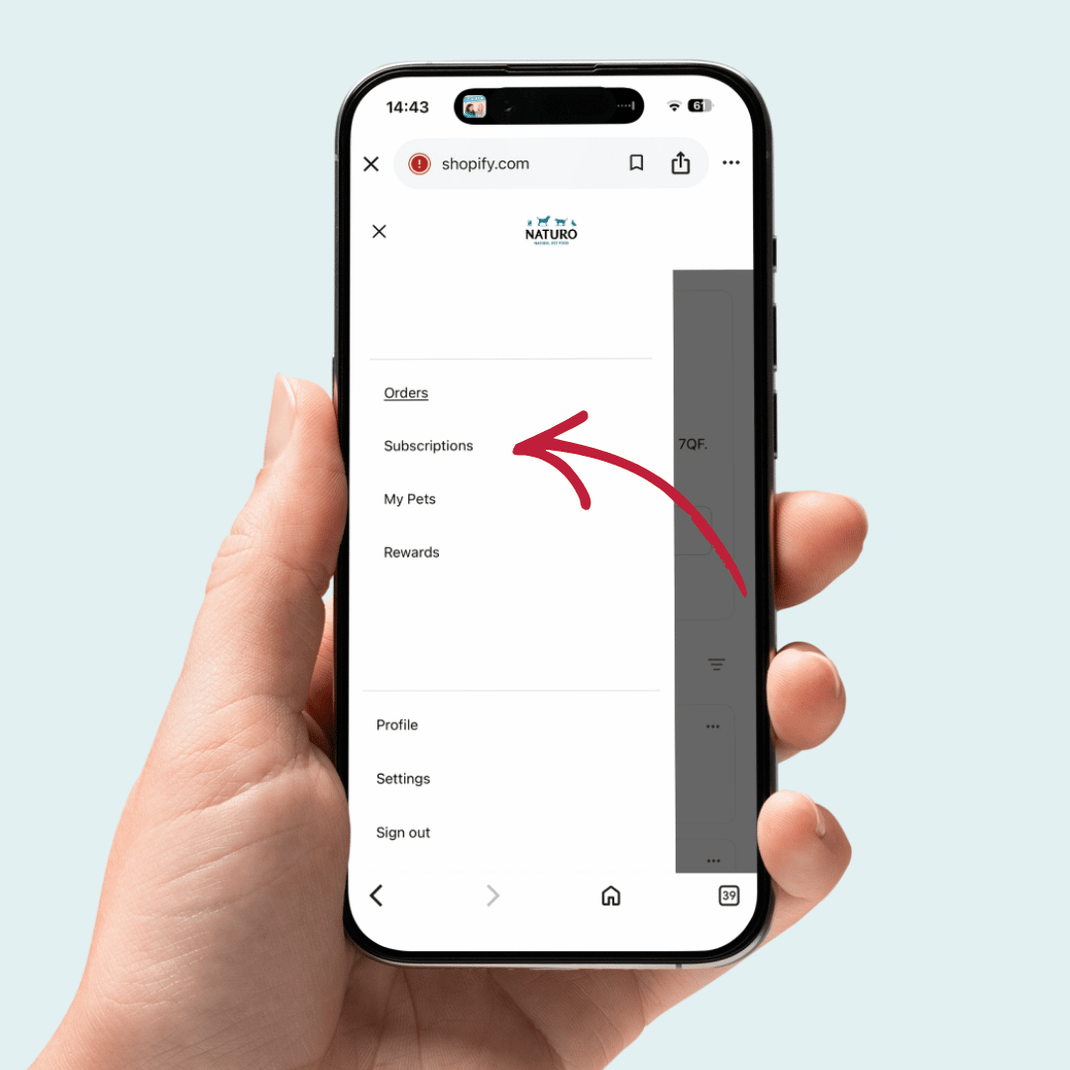 Hand holding a smartphone displaying the Naturello app with a red arrow pointing to the 'Subscriptions' section.